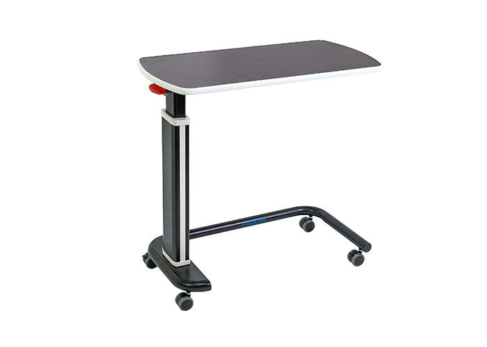 移動可能なHPLの旋回装置の調節可能な忍耐強いベッドの病院の食卓の高さ